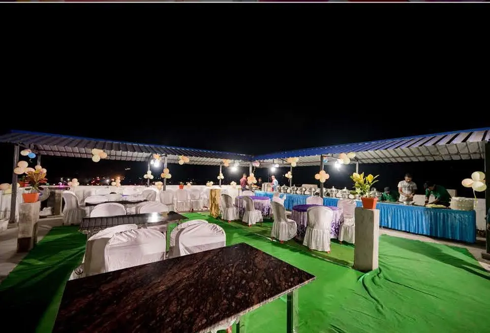 Rooftop party setup with buffet counters